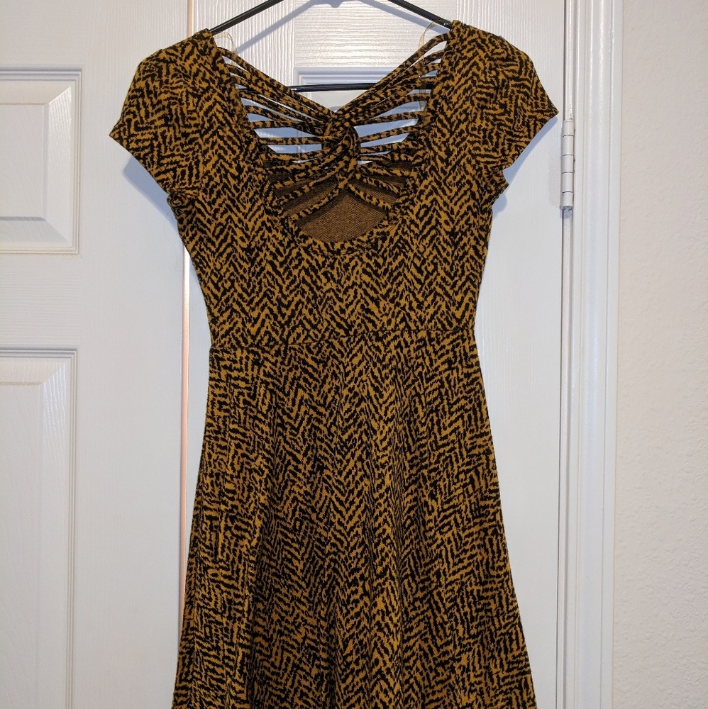Animal print dress with elaborate back